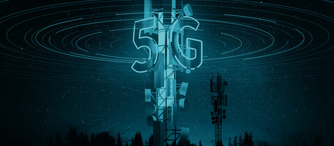 Radio Tower lite up at night with centered 5G in the middle of image.